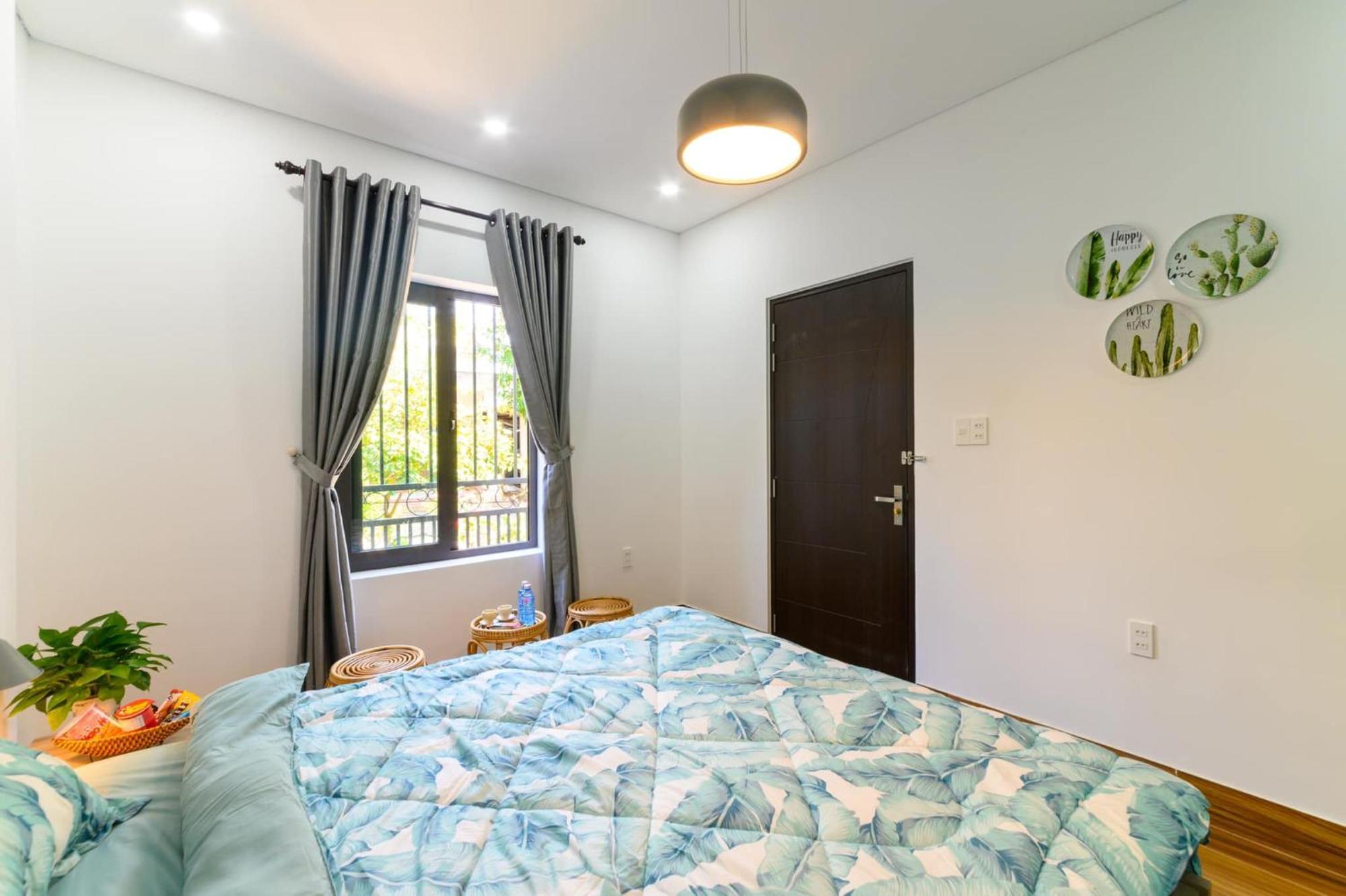 Kivi Homestay Хойан Экстерьер фото